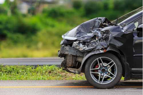 Damaged car, Atlanta car accident lawyer concept