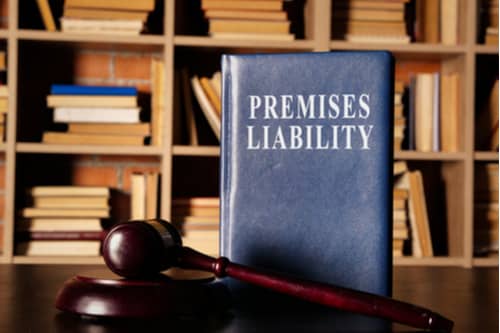 Premises liability book and judge gavel, Riverdale premises liability lawyer concept