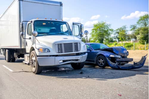 Collision of truck and car, East Point truck accident lawyer concept