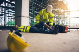 Injured construction worker who needs a Riverdale workers’ compensation lawyer